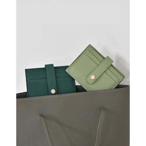 green leather shoulder bag