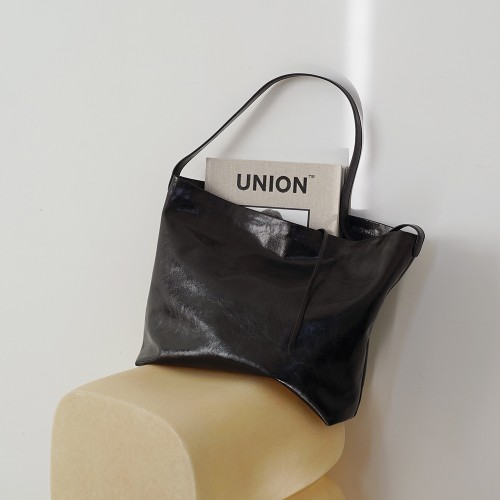 uptown pouch in grain de poudre embossed leather