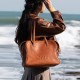 Cowhide shoulder tote bag, briefcase, pillow bag - Memoo.com