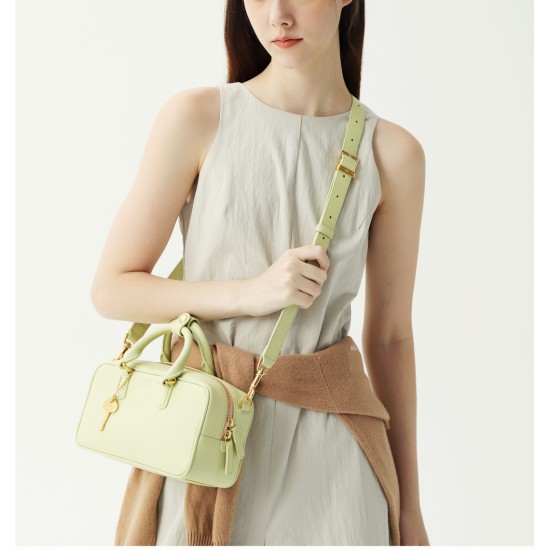 Leather tote bag worn crossbody over one shoulder - Memoo.com