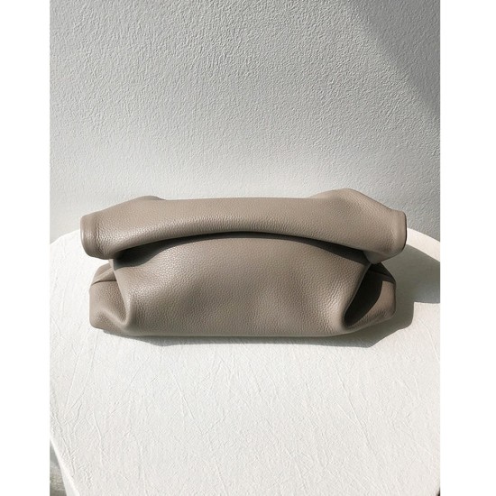 A chic rolled-edge leather clutch