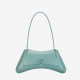 Green cowhide covered single piece handbag